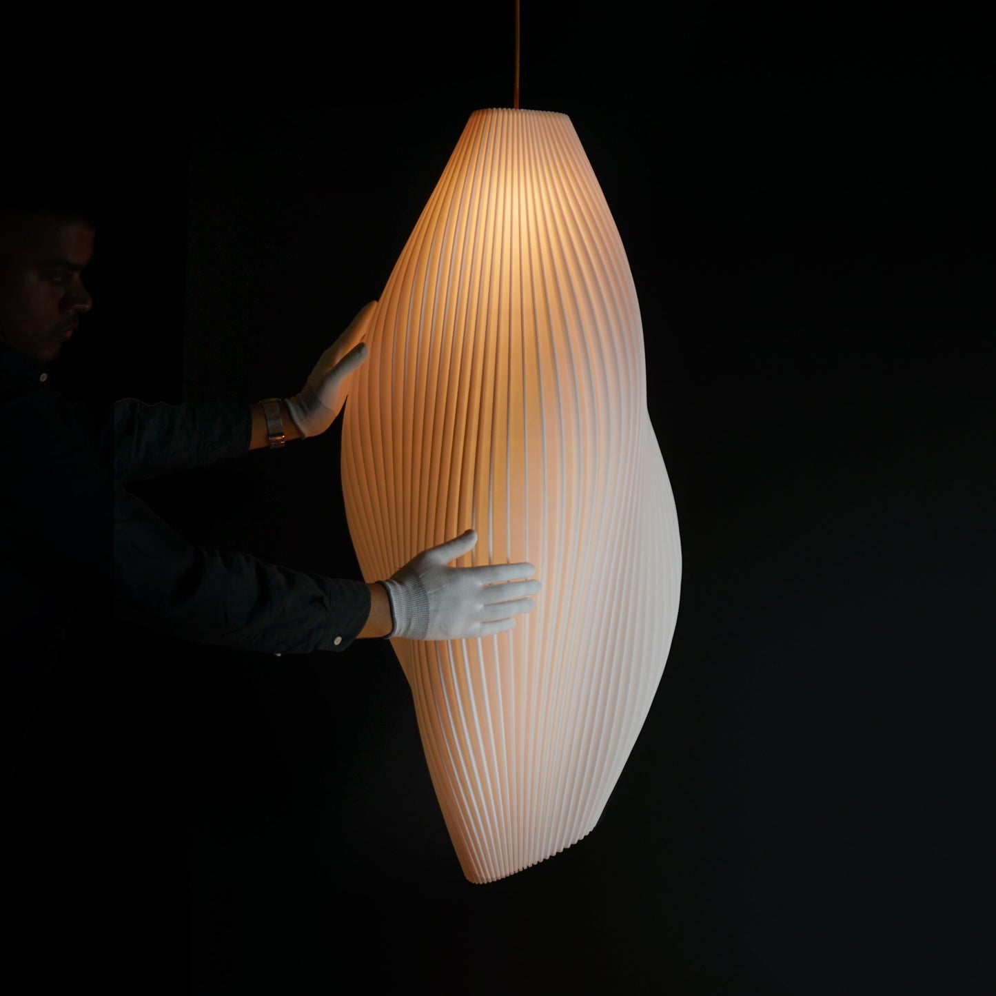 Modern interior featuring Large White Wave Pendant Light as a bespoke sculptural statement fixture