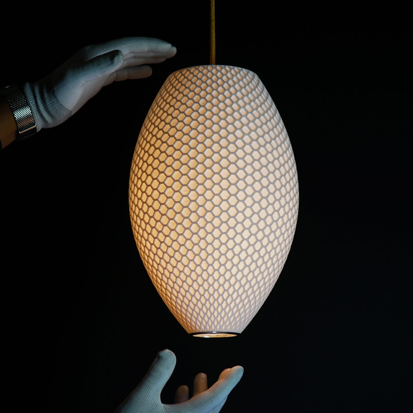 Modern interior featuring Long White Hive Pendant Light as luxury sculptural statement fixture