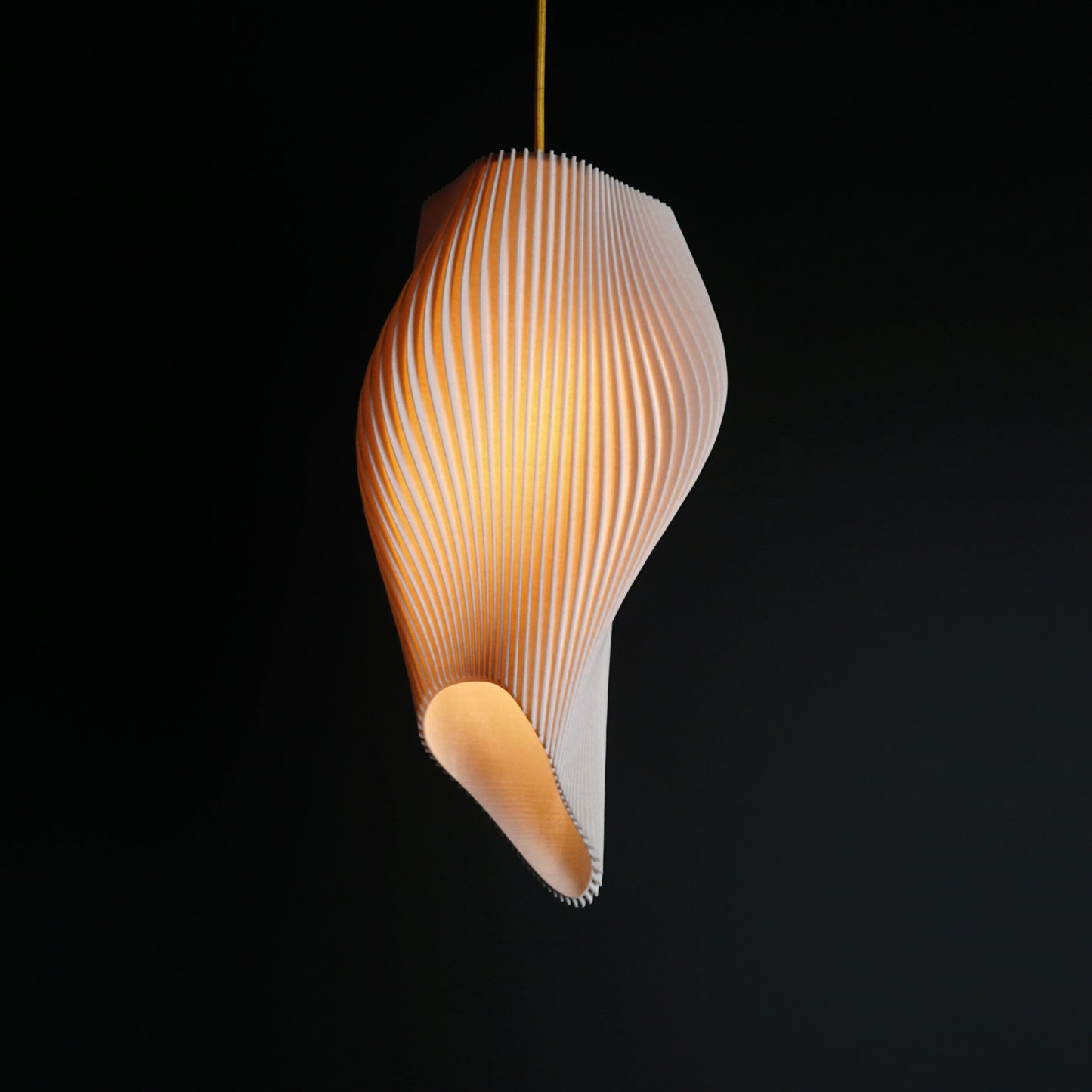 Modern interior featuring Straw Long Wave Pendant Light as luxury sculptural statement fixture in high-ceiling space