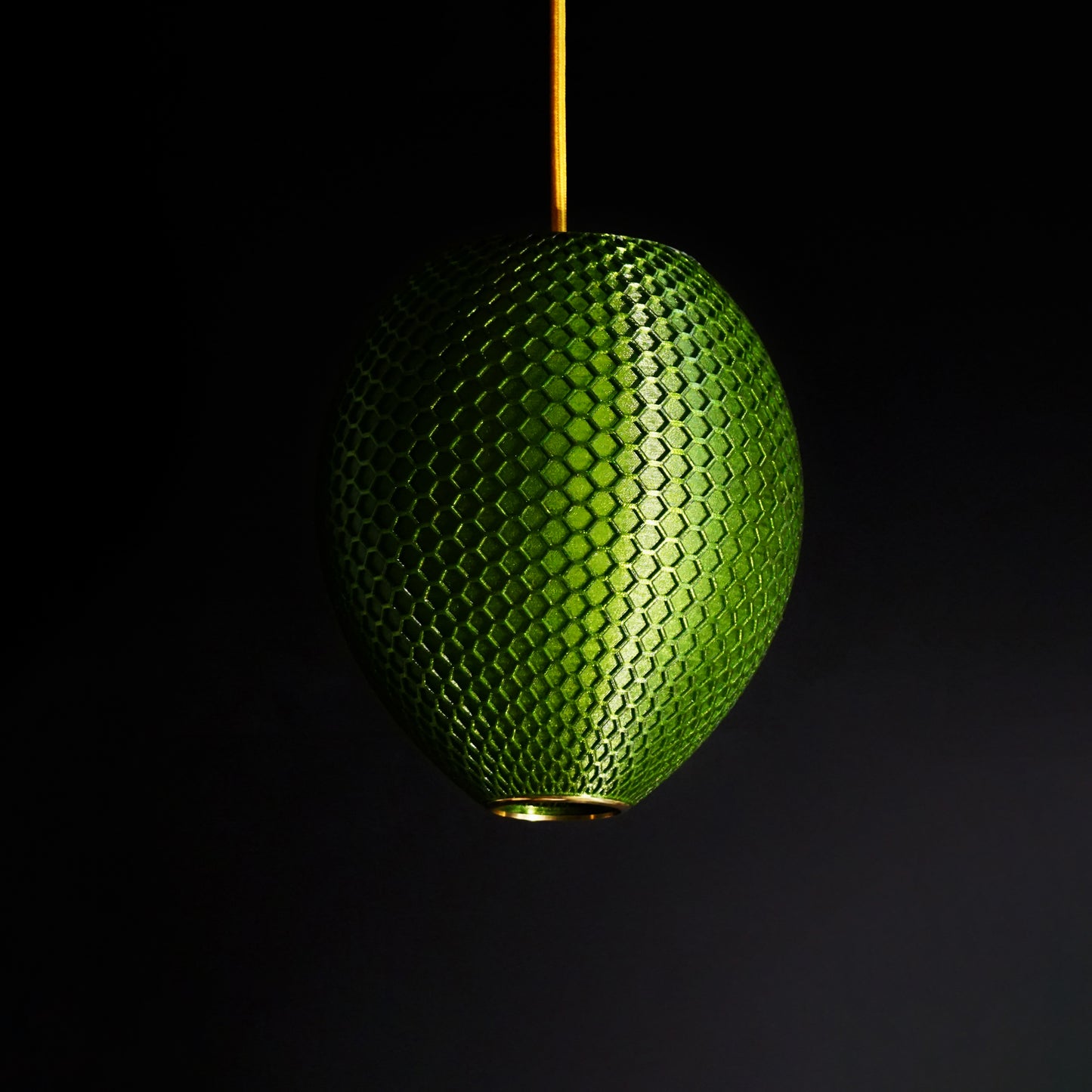 Emerald Green Hive Pendant Light with luxury sculptural design and intricate honeycomb pattern for modern interiors