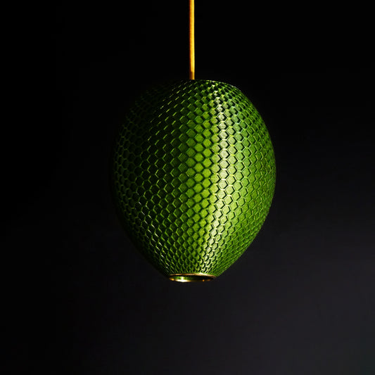 Emerald Green Hive Pendant Light with luxury sculptural design and intricate honeycomb pattern for modern interiors