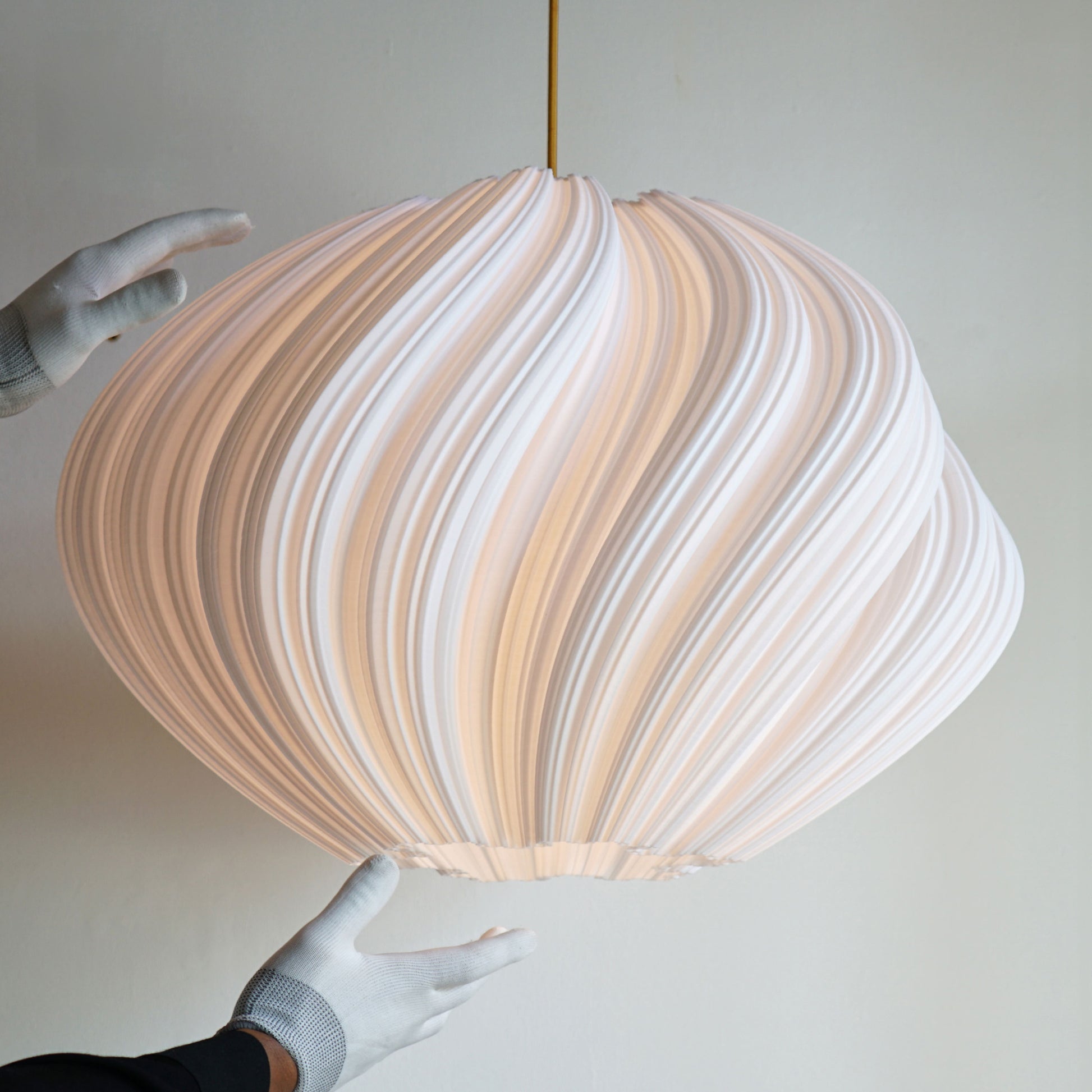 Close-up of Large White Seashell Pendant Light highlighting sculptural curves and dynamic texture
