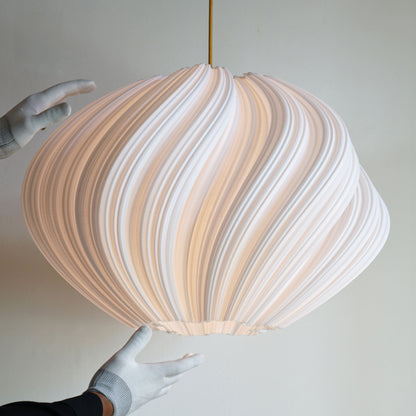 Close-up of Large White Seashell Pendant Light highlighting sculptural curves and dynamic texture