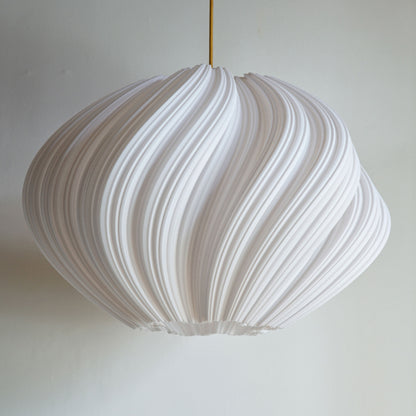 Large White Seashell Pendant Light shown turned off highlighting flowing spiral design and sculptural elegance