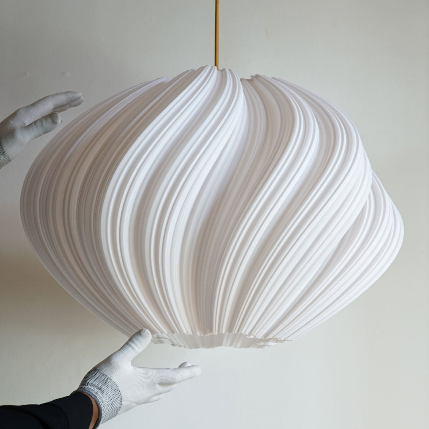 Side view of Large White Seashell Pendant Light showing flowing spiraling form and elegant curves
