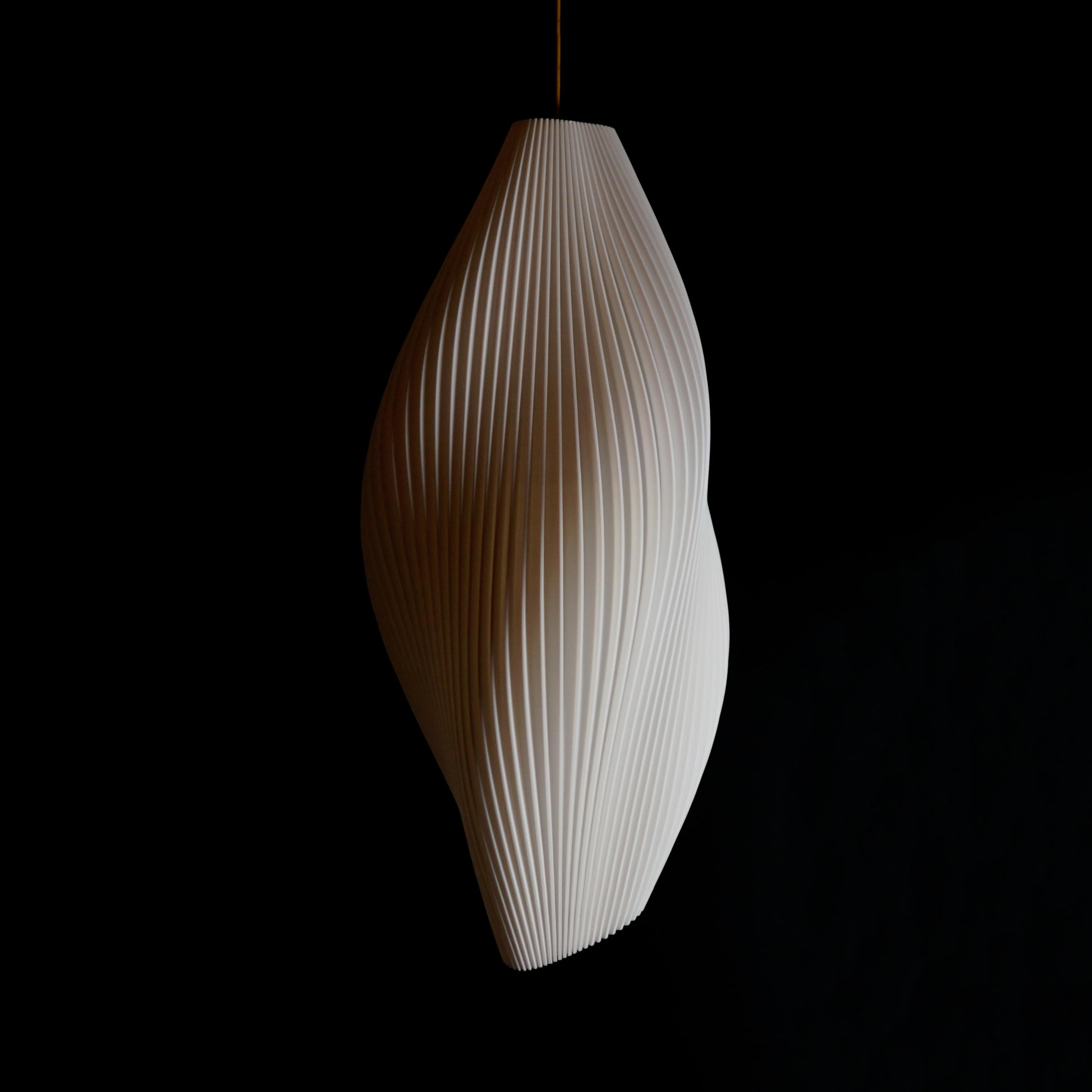 Large White Wave Pendant Light shown turned off highlighting sculptural wave-inspired curves and elegant design