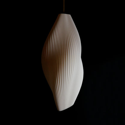 Large White Wave Pendant Light shown turned off highlighting sculptural wave-inspired curves and elegant design