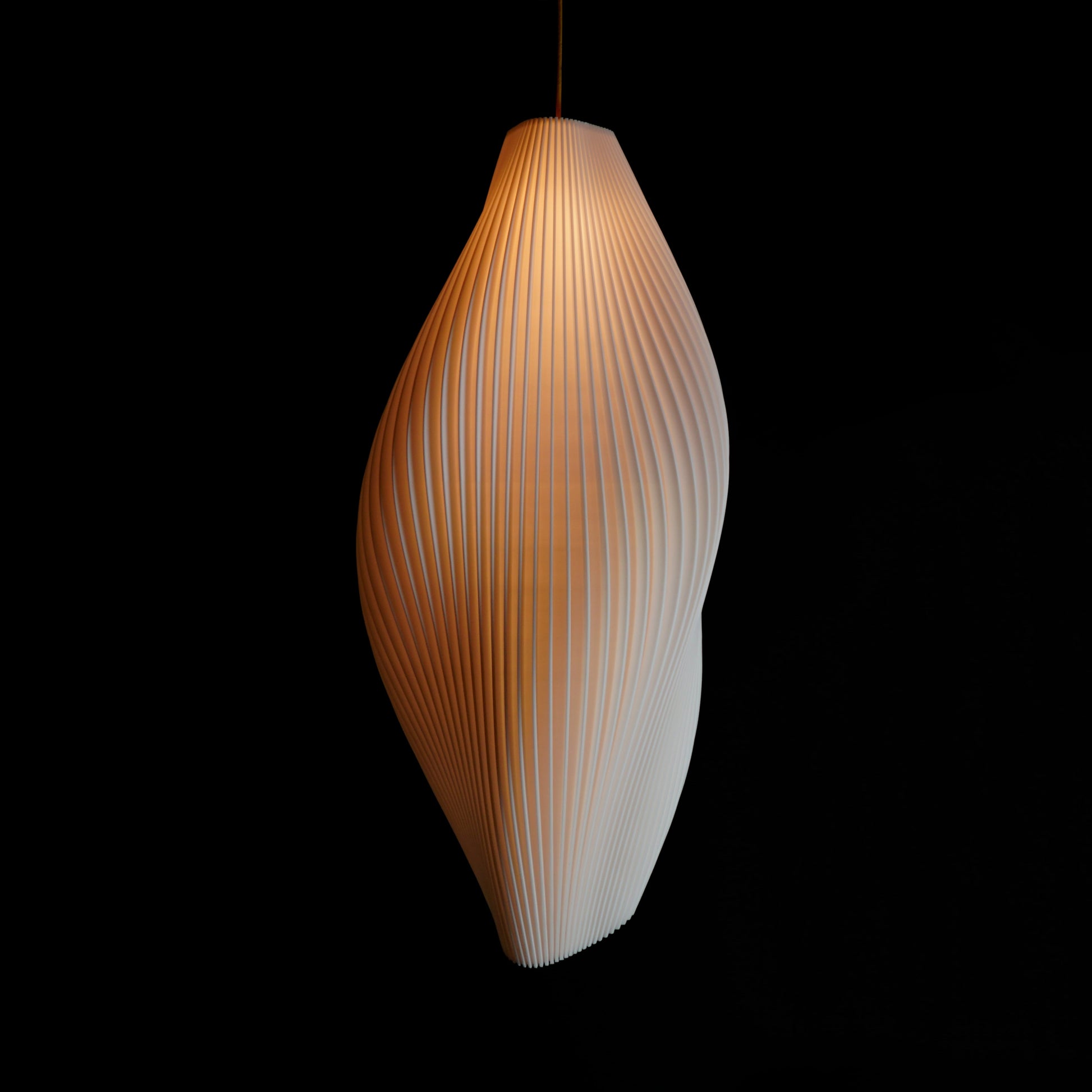 Side view of Large White Wave Pendant Light showing undulating wave-inspired curves