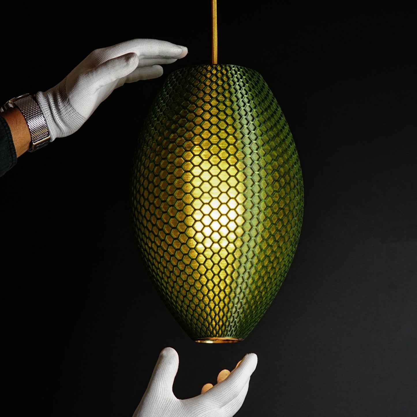 Close-up of hexagonal hive pattern on Long Emerald Green Hive Pendant Light