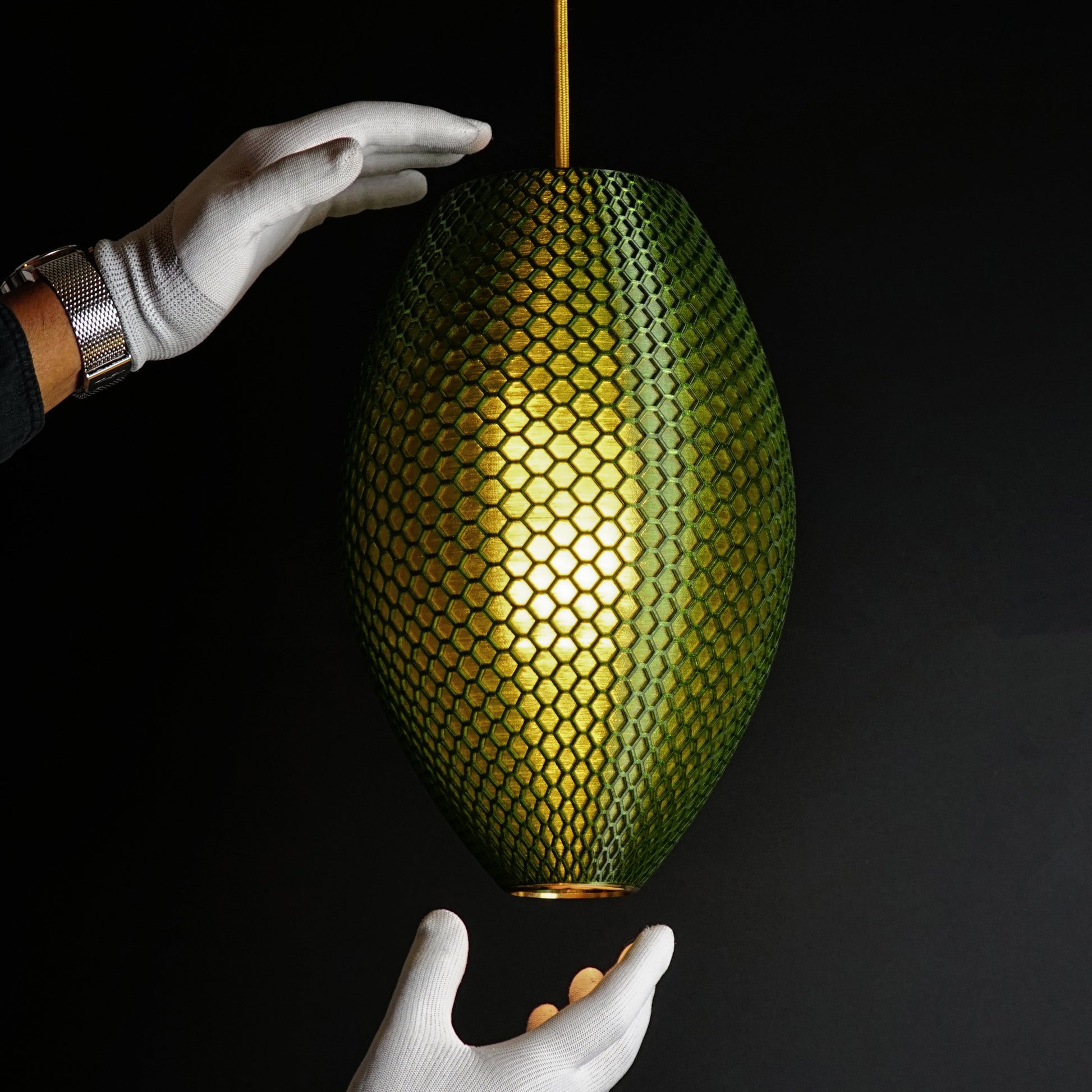 Close-up of hexagonal hive pattern on Long Emerald Green Hive Pendant Light