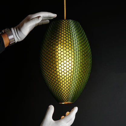 Close-up of hexagonal hive pattern on Long Emerald Green Hive Pendant Light