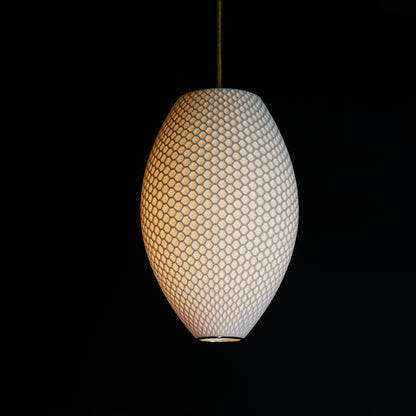Long White Hive Pendant Light with elongated geometric design and luxury sculptural form for contemporary interiors