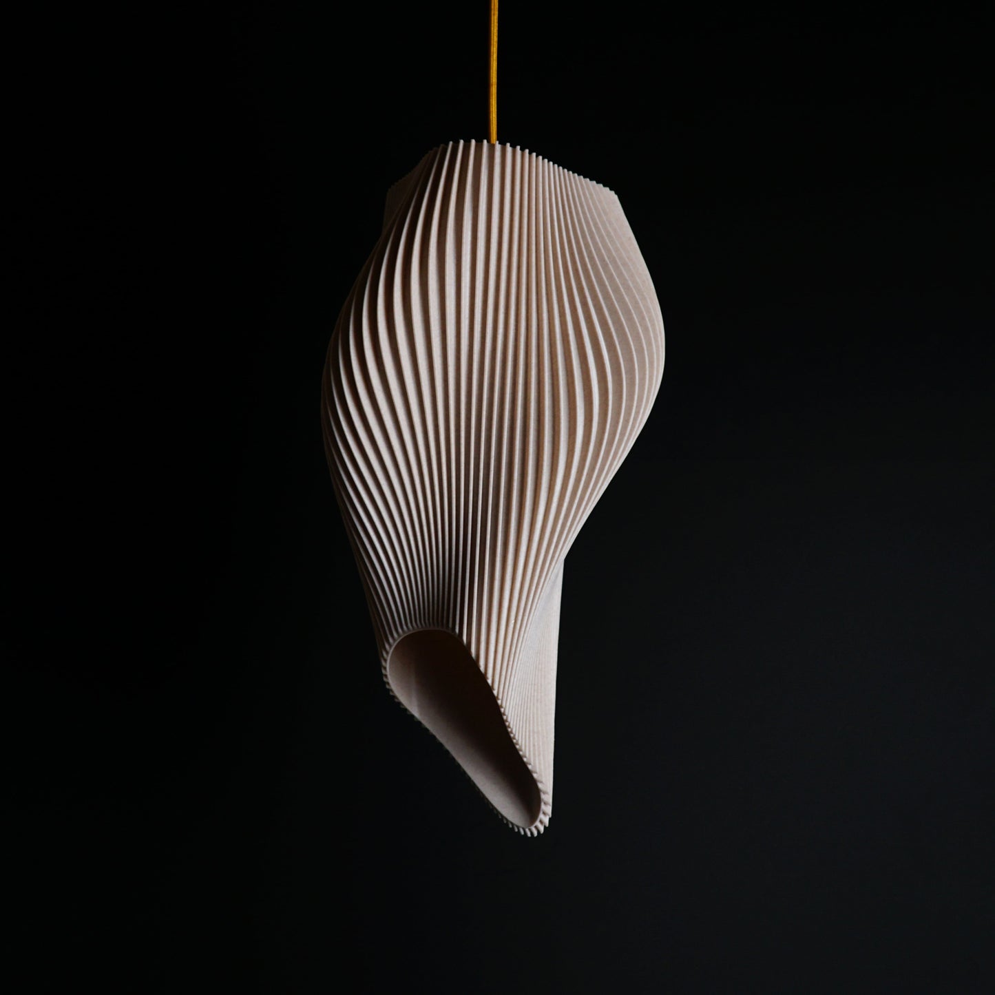 Straw Long Wave Pendant Light shown turned off highlighting elongated wave form and textured straw finish