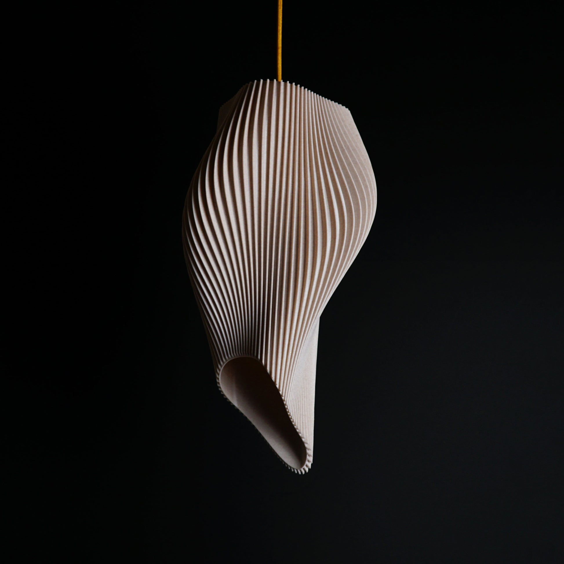 Straw Long Wave Pendant Light shown turned off highlighting elongated wave form and textured straw finish