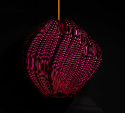 Violet Purple Seashell Pendant Light shown turned off highlighting flowing sculptural curves and dimensional texture