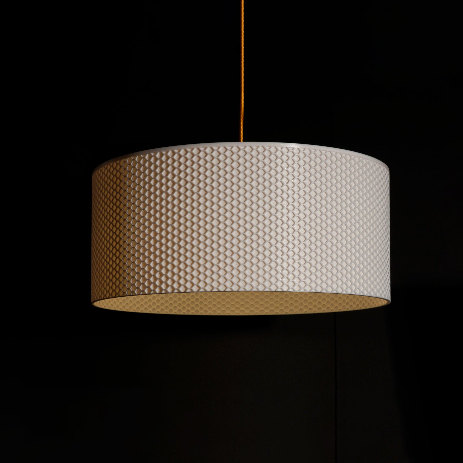 White Drum Hive Pendant Light with cylindrical drum form and sculptural hive-inspired pattern