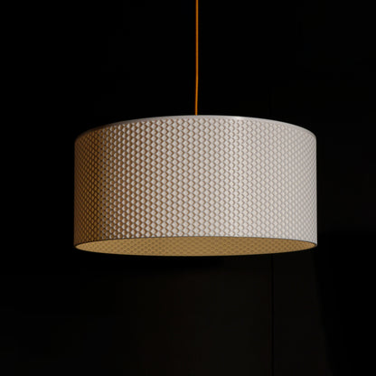 White Drum Hive Pendant Light with cylindrical drum form and sculptural hive-inspired pattern